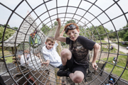 Boys in wire tunnel