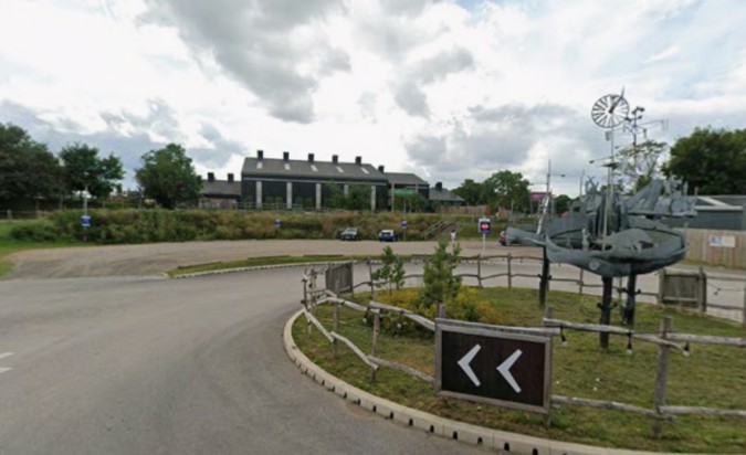 Entrance roundabout and sculpture at Hobbledown Heath in Feltham.