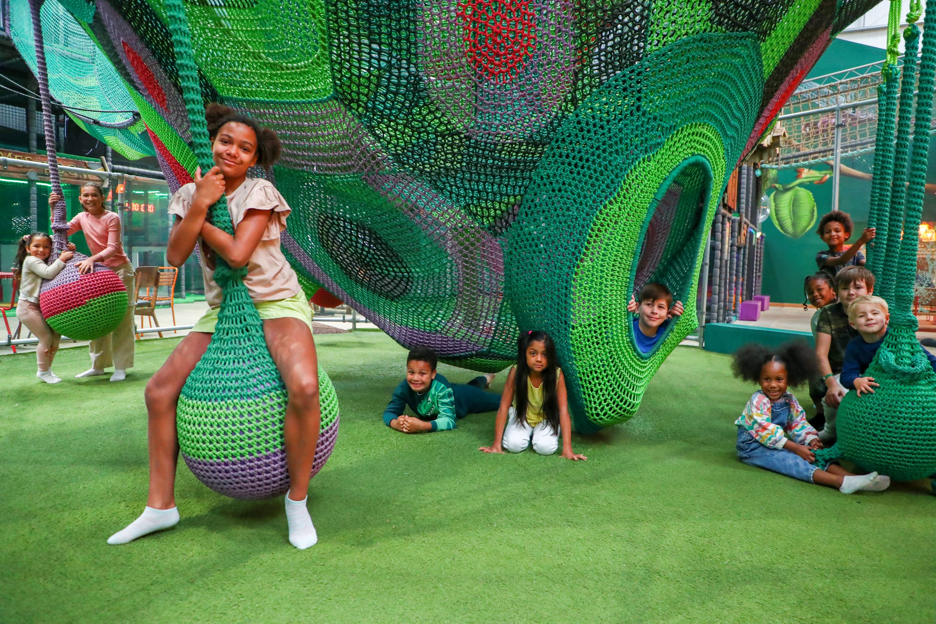 Indoor play area at Hobbledown Heath in Hounslow with large soft play climbing frames