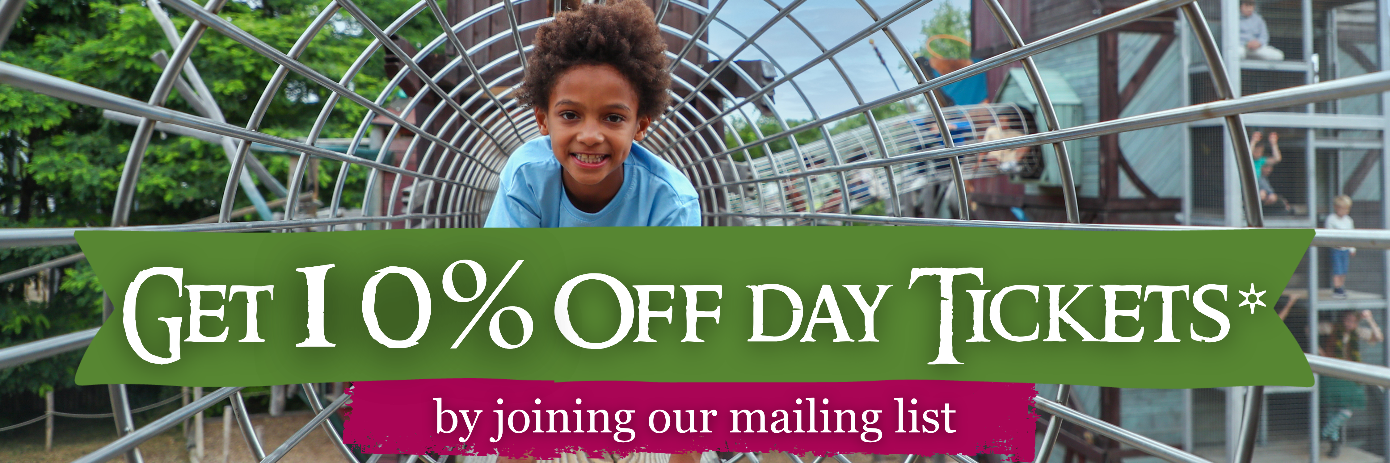 Child playing in tunnel at Hobbledown Heath with 10% off day tickets offer when joining the mailing list