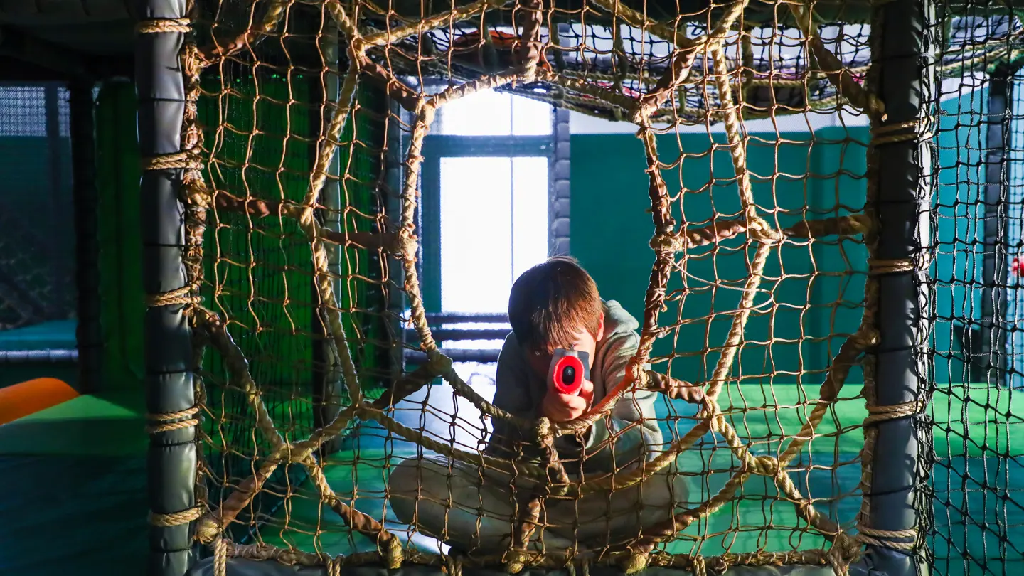 Children playing laser tag at Hobbledown Heath, Hounslow, West London